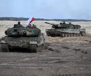 epa10424671 (FILE) - Polish 'Leopard 2'  tanks during the maneuvers of the Visegrad Group countries, the United States and the United Kingdom ph. 'PUMA 22' at the training ground in Nowa Deba, southeast Poland, 09 November 2022 (reissued 23 January 2023). During a tour through the country, Polish Prime Minister Mateusz Morawiecki announced in Poznan on 23 January 2023, that Poland will 'formally ask Germany for permission to hand over some of its German-made Leopard 2 tanks to Ukraine', the Polish news agency PAP reported.  EPA/Darek Delmanowicz  POLAND OUT