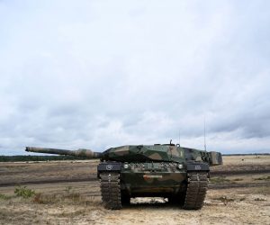 epa10424669 (FILE) - A Polish 'Leopard 2' tank during the Exercise NIEDZWIEDZ-22 with the participation of subunits from all units of the 18th Mechanized Division and allied troops from the United States and the United Kingdom at the training ground in Nowa Deba, southeast Poland, 20 September 2022 (reissued 23 January 2023). During a tour through the country, Polish Prime Minister Mateusz Morawiecki announced in Poznan on 23 January 2023, that Poland will 'formally ask Germany for permission to hand over some of its German-made Leopard 2 tanks to Ukraine', the Polish news agency PAP reported.  EPA/Darek Delmanowicz  POLAND OUT