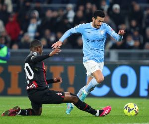 epa10427446 Pedro Rodriguez of Lazio (R) vies for the ball with Pierre Kalulu Kyatengwa of Milan (L) during the Italian soccer match between SS Lazio and AC Milan, in Rome, Italy, 24 January 2023.  EPA/FEDERICO PROIETTI