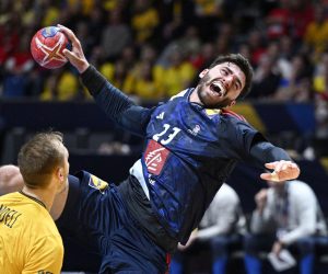 epa10434808 France's Ludovic Fabregas and Sweden's Lukas Sandell (L) during the IHF Men's World Championship handball semi final match between France and Denmark, in Stockholm, Sweden, 27 January 2023.  EPA/Anders Wiklund  SWEDEN OUT