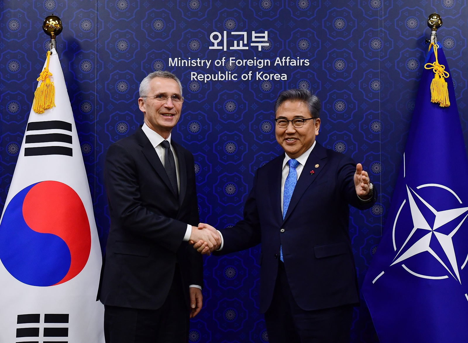 epa10437569 NATO Secretary General Jens Stoltenberg (L) shakes hands with the Minister of Foreign Affairs of South Korea Park Jin (R) during their meeting at the Foreign Ministry in Seoul, South Korea, 29 January 2023.  EPA/Kim Min-Hee / POOL