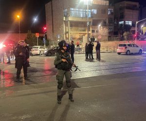 epa10434657 Emergency services work at the scene of a shooting at a synagogue in Neve Yaakov area of Jerusalem, Israel, 27 January 2023. According to a police spokesperson, at least eight people were killed and several injured in a shooting attack at a synagogue.  EPA/ATEF SAFADI