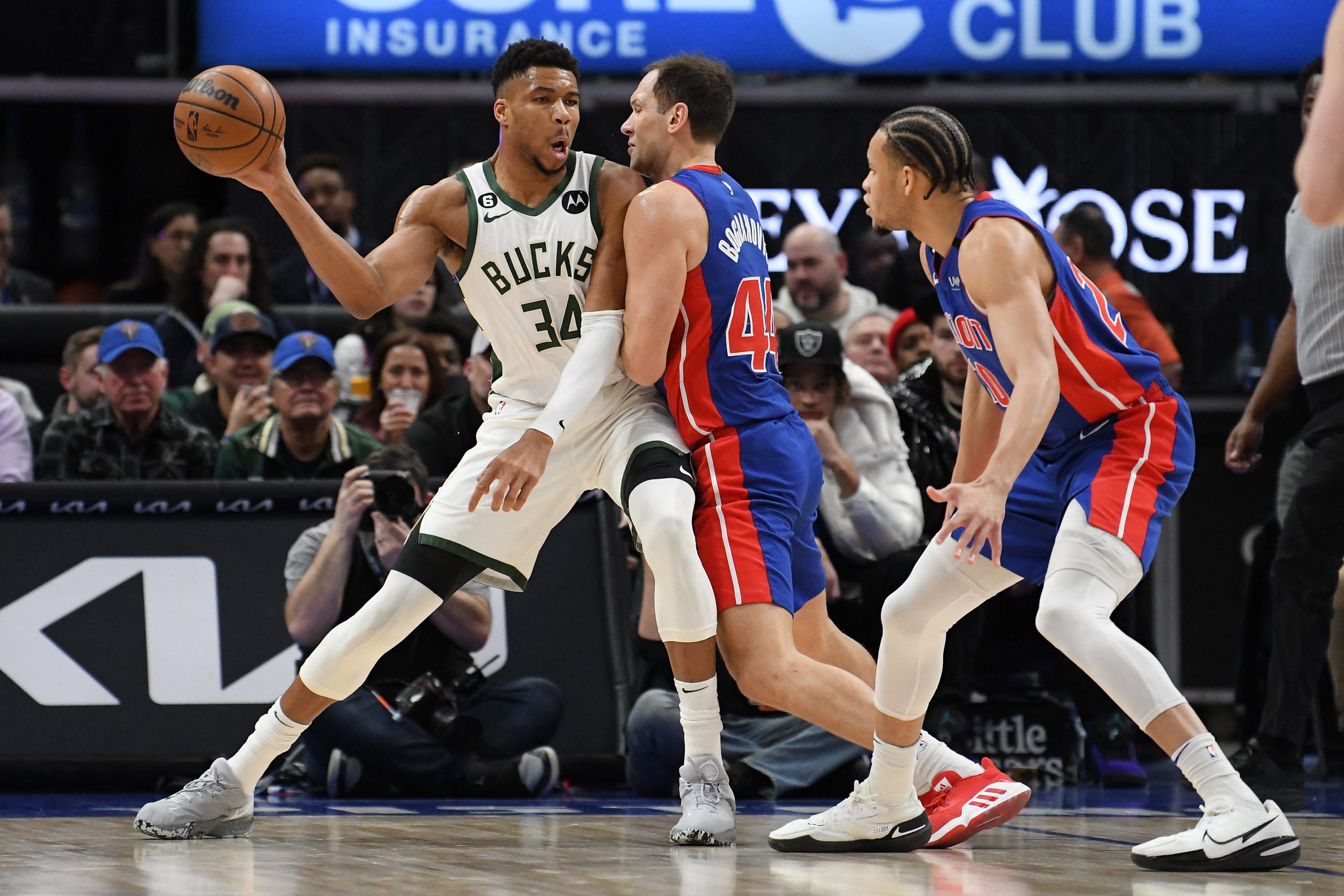 Jan 23, 2023; Detroit, Michigan, USA; Milwaukee Bucks forward Giannis Antetokounmpo (34) looks to pass the ball while being pressured by Detroit Pistons forward Bojan Bogdanovic (44) in the first quarter at Little Caesars Arena. Mandatory Credit: Lon Horwedel-USA TODAY Sports Photo: Lon Horwedel/REUTERS