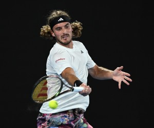 epa10426279 Stefanos Tsitsipas of Greece hits a forehand in his quarter final match against Jiri Lehecka of the Czech Republic at the Australian Open tennis tournament in Melbourne, Australia 24 January 2023.  EPA/LUKAS COCH AUSTRALIA AND NEW ZEALAND OUT