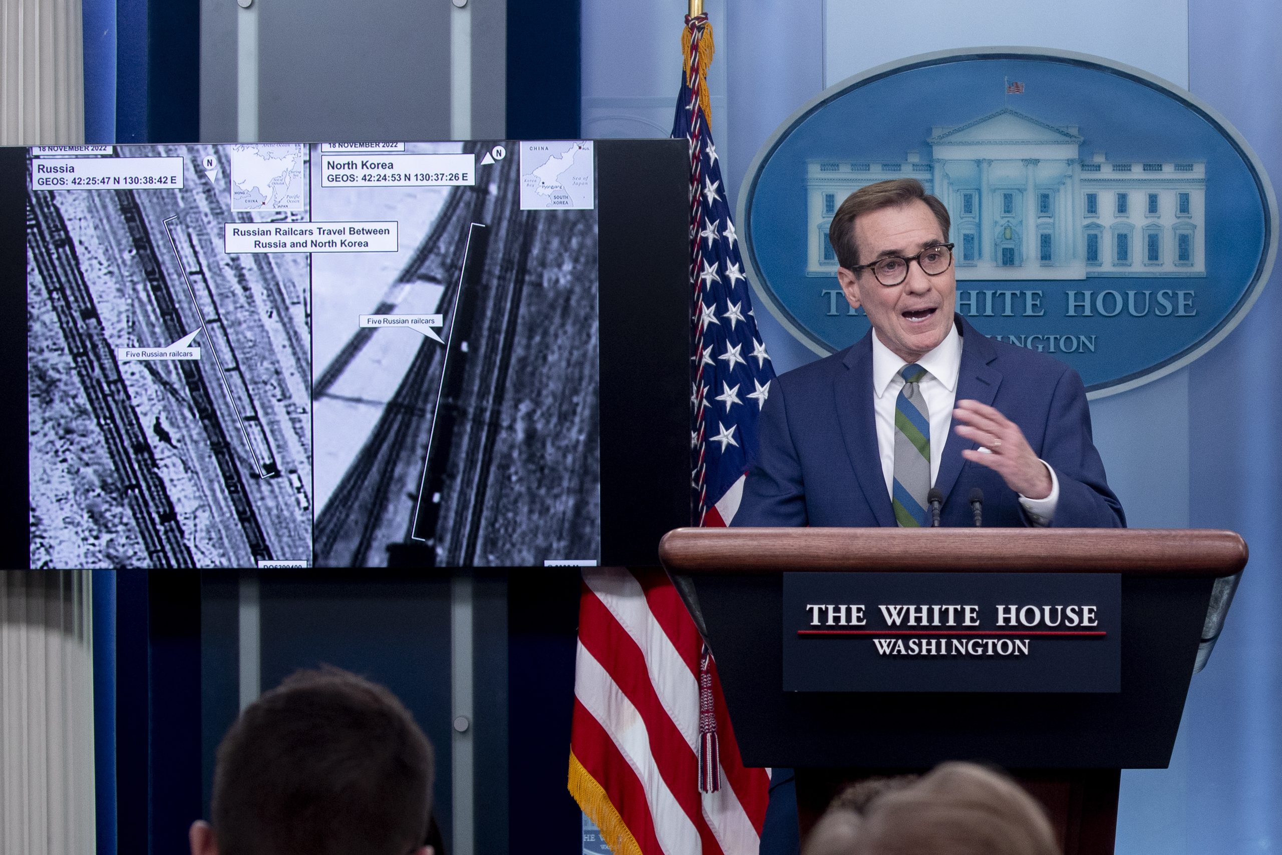 epa10418784 Coordinator for Strategic Communications at the National Security Council in the White House John Kirby speaks beside monitors depicting images that the White House says show North Korean arms being transported by Russian railcars, during a news briefing in the James Brady Press Briefing Room of the White House in Washington, DC, USA, 20 January 2023. The United States will impose new sanctions against Russian private military company, Wagner Group; and will declare it a 'Transnational Criminal Organization' for aiding Russia's effort in the war in Ukraine.  EPA/MICHAEL REYNOLDS