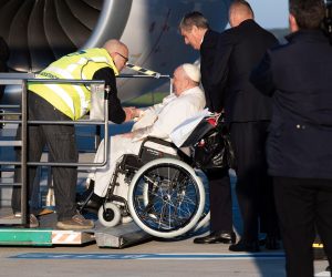 epa10440761 Pope Francis, seated on a wheelchair goes to be lifted on a platform to board his plane at Rome's Fiumicino airport, heading to Democratic Republic of Congo and South Sudan in Rome, Italy, 31 January 2023. Pope Francis heads to Democratic Republic of Congo and South Sudan, delivering a message of peace and reconciliation to two sub-Saharan African nations plagued by conflict. The pontiff flies to the Congolese capital Kinshasa on January 31 before heading on Friday to Juba, the capital of South Sudan where he will be joined by the leaders of the Anglican Church and the Church of Scotland.  EPA/TELENEWS
