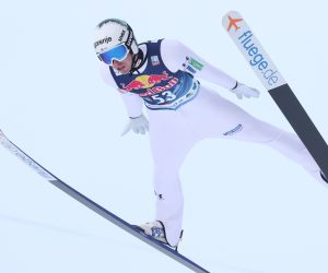 epa10438559 Timi Zajc of Slovenia in action during for the FIS Ski Flying World Cup competition at the Kulm mammoth hill in Bad Mitterndorf, Austria, 29 January 2023.  EPA/Grzegorz Momot POLAND OUT