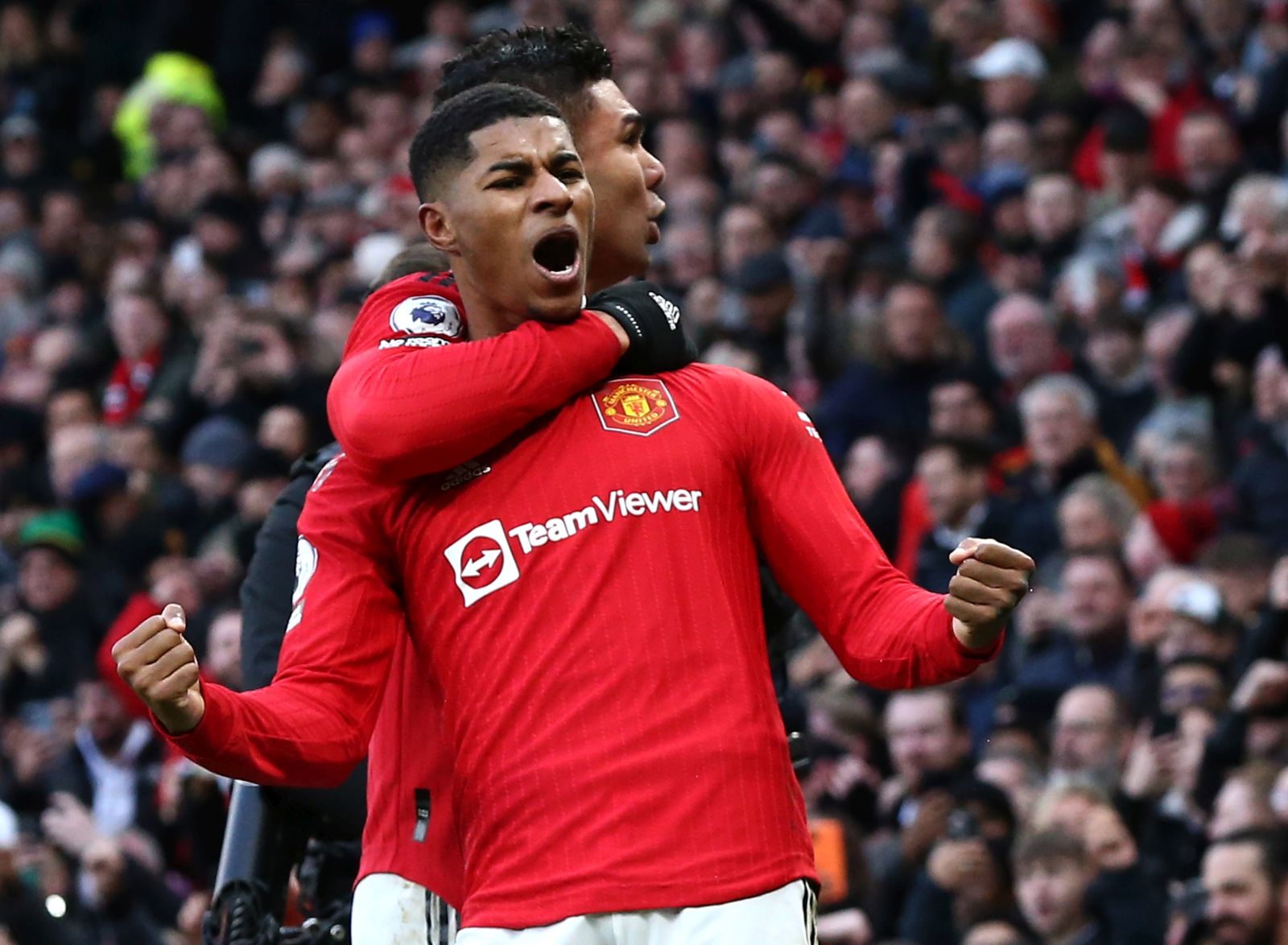 epa10405059 Manchester United's Marcus Rashford (front) celebrates scoring the 2-1 lead during the English Premier League soccer match between Manchester United and Manchester City in Manchester, Britain, 14 January 2023.  EPA/Adam Vaughan EDITORIAL USE ONLY. No use with unauthorized audio, video, data, fixture lists, club/player publications