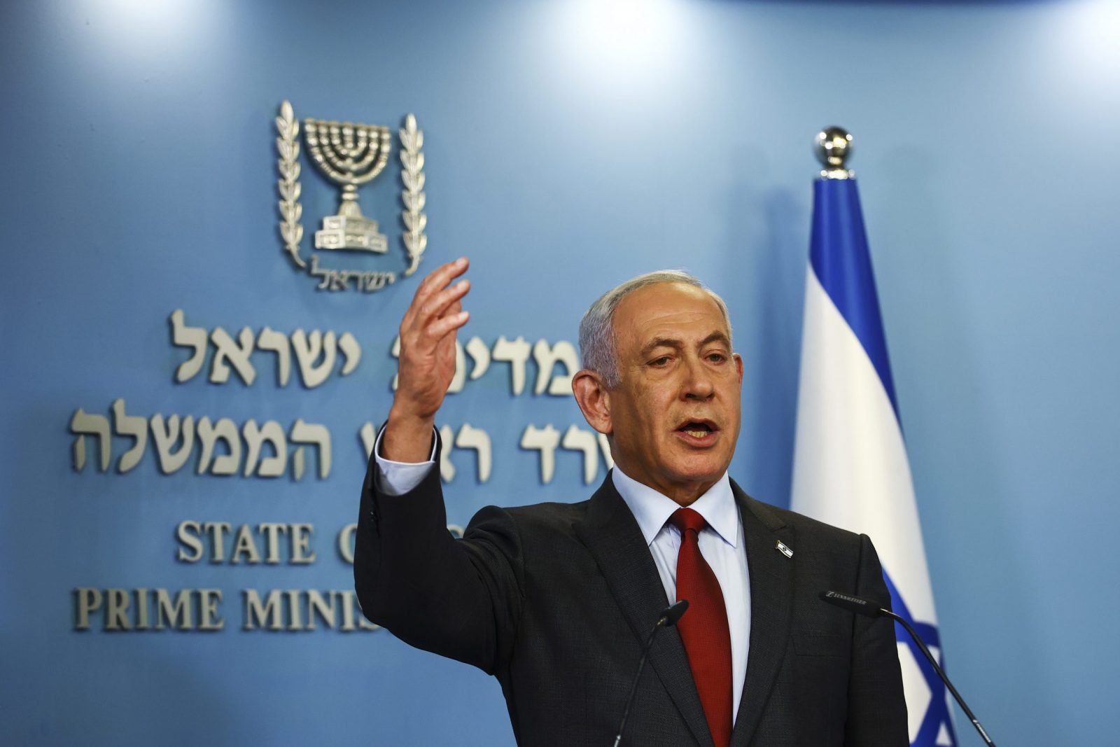 epa10429465 Israeli Prime Minister Benjamin Netanyahu gestures as he speaks at a news conference at the Prime Minister's office in Jerusalem, Israel, 25 January 2023.  EPA/RONEN ZVULUN / POOL