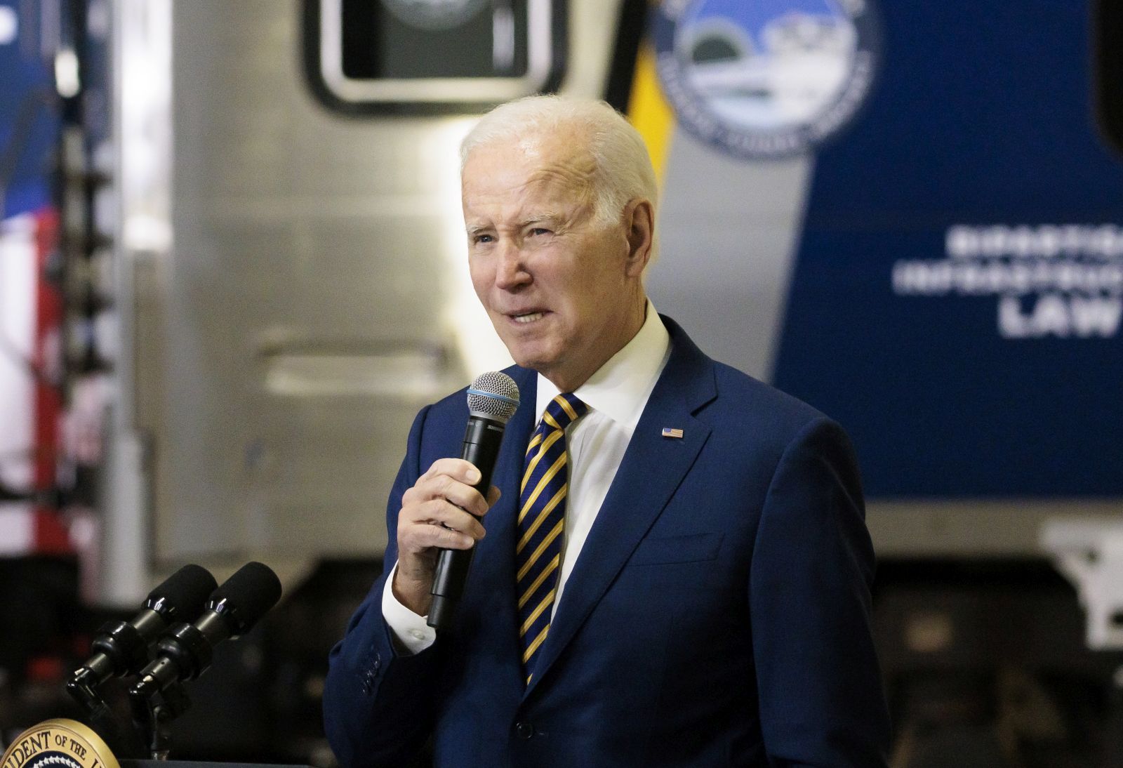 epa10441588 US President Joseph Biden speaks about federal infrastructure funding for the Hudson River Tunnel Project at an event in the Hudson Yards train yard in New York, New York, USA, 31 January 2023.  EPA/JUSTIN LANE