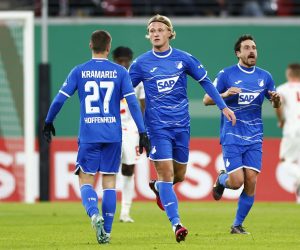 epa10443105 Hoffenheim's Kasper Dolberg (C) celebrates with teammate Andrej Kramaric (L) after scoring the team's first goal during the German Cup round of 16 soccer match between RB Leipzig and 1899 Hoffenheim in Leipzig, Germany, 01 February 2023.  EPA/HANNIBAL HANSCHKE