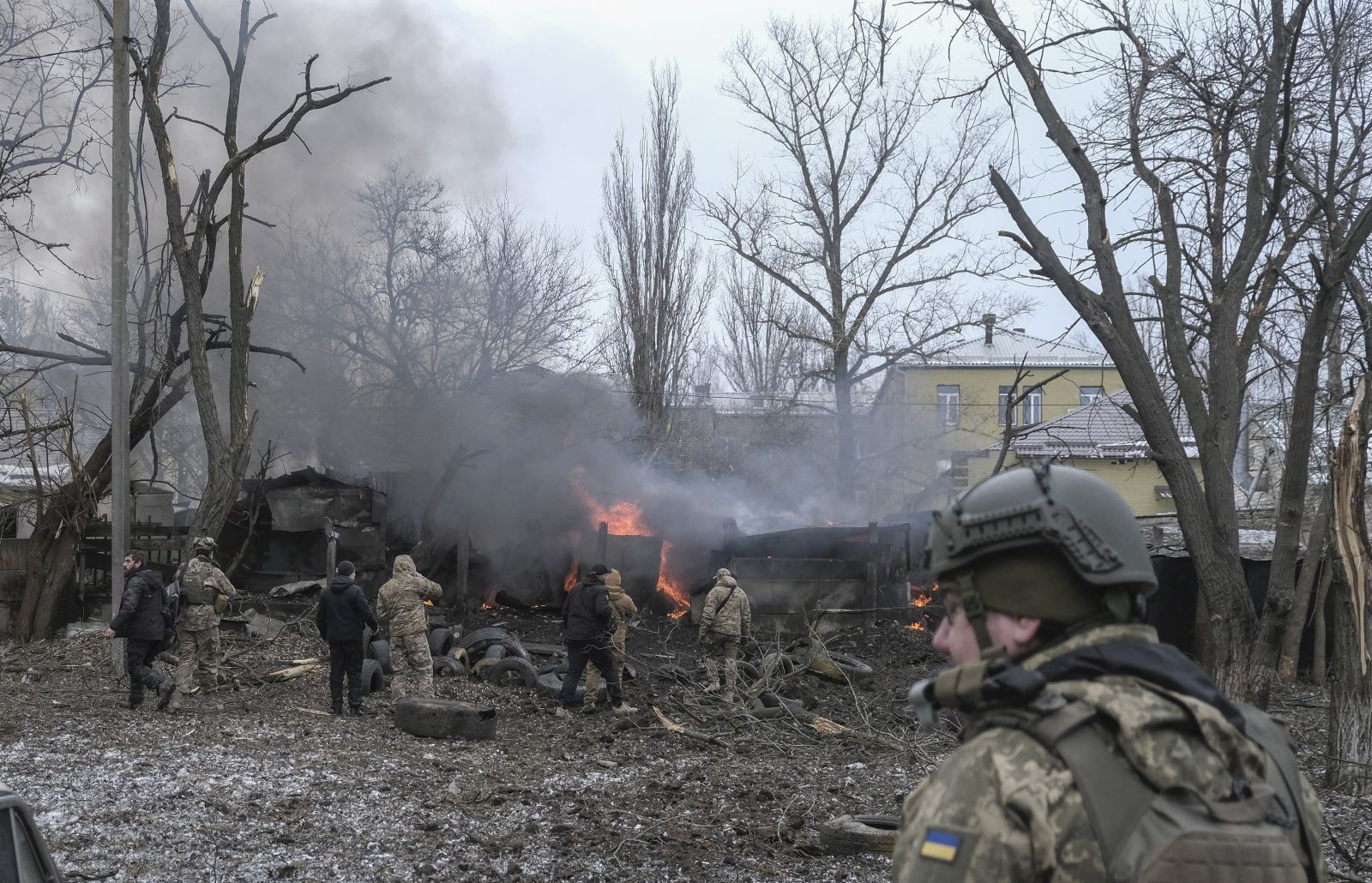 epa10444413 Ukrainian rescuers work at the site of a rocket attack on a residential area in Kramatorsk, Donetsk region, eastern Ukraine, 02 February 2023, amid Russia's invasion. At least five people were injured after two rockets hit on the day a residential area in Kramatorsk, the head of Ukraine's Donetsk Regional Military Administration, Pavlo Kyrylenko said in a statement. The rockets hit an area near the site of overnight shelling on a four-story residential building, where at least three people were killed and 18 others injured, according to the State Emergency Service of Ukraine (SES). Russian troops entered Ukraine territory on 24 February 2022 starting a conflict that has provoked destruction and a humanitarian crisis.  EPA/SERGEY SHESTAK