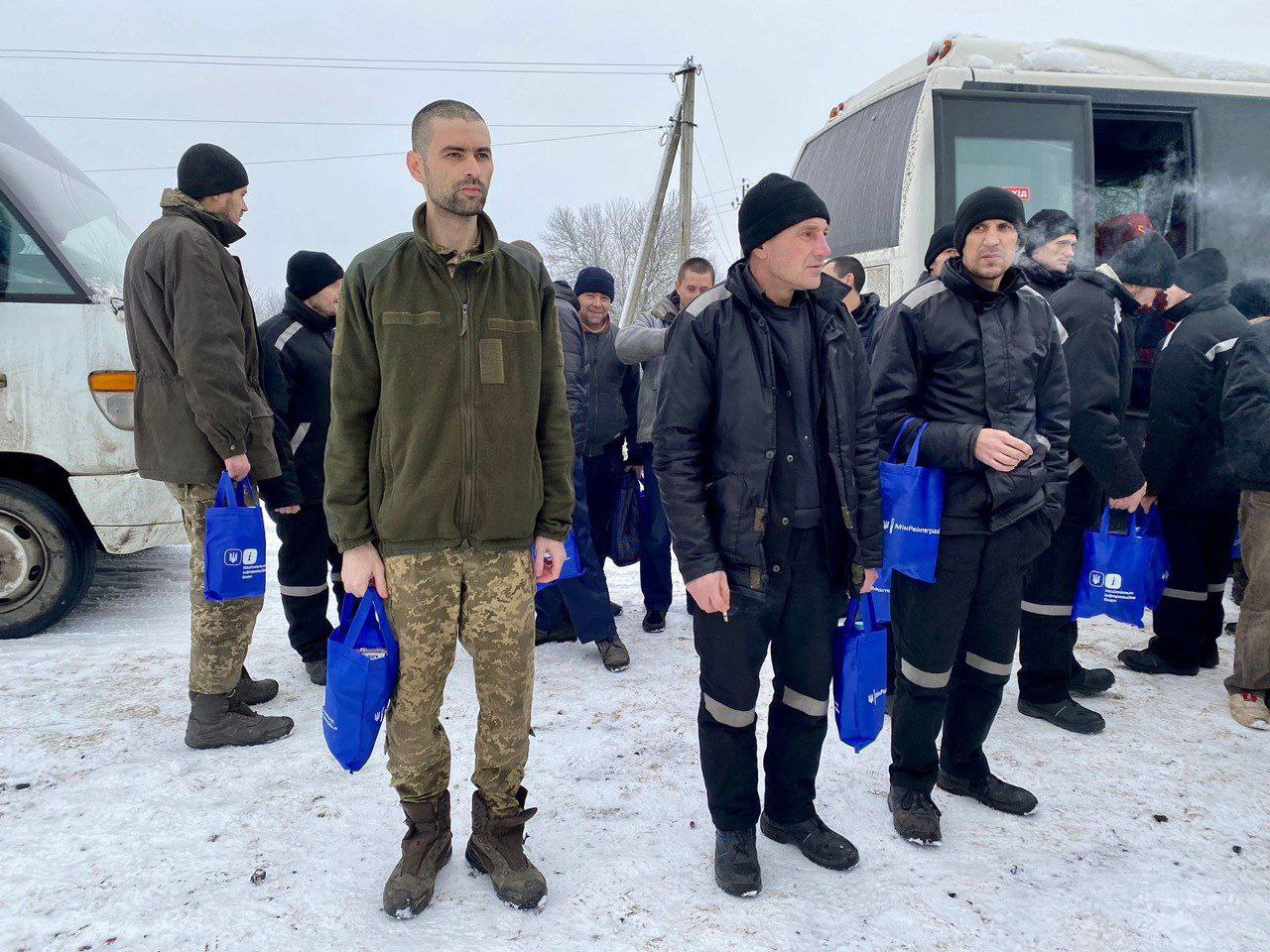 epa10447045 A handout photo made available by the Ministry of Defence of Ukraine on 04 February 2023 shows Ukrainian prisoners of war (POWs) after a prisoner exchange at an undisclosed location in Ukraine. The Head of the Office of the President of Ukraine, Andriy Yermak, announced on 04 February 2023, that 116 Ukrainian military personnel were freed from Russian captivity and returned to Ukraine in a prisoner exchange. Along with the POWs, the bodies of British volunteers Chris Parry and Andrew Bagshaw, as well of volunteer Evgen Kulyk, had been returned, Yermak added. The Russian Ministry of Defense said in a statement that 63 servicemen of the Armed Forces of the Russian Federation were freed as a result of a 'complex negotiation process'.  EPA/MINISTRY OF DEFENCE OF UKRAINE HANDOUT -- BEST QUALITY AVAILABLE -- MANDATORY CREDIT: MINISTRY OF DEFENCE OF UKRAINE -- HANDOUT EDITORIAL USE ONLY/NO SALES