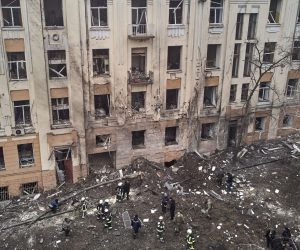 epa10448648 Ukrainian rescuers work at the site of a damaged residential building following a missile strike, in Kharkiv, northeastern Ukraine, 05 February 2023, amid Russia's invasion. At least four people were injured after two Russian missiles hit downtown Kharkiv on 05 February, the head of the Kharkiv regional military administration, Oleg Sinegubov wrote on telegram. Kharkiv and surrounding areas have been the target of heavy shelling since February 2022, when Russian troops entered Ukraine starting a conflict that has provoked destruction and a humanitarian crisis.  EPA/SERGEY KOZLOV