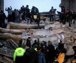 epa10450296 Turkish emergency personnel and others try to help victims at the site of a collapsed building after an earthquake in Diyarbakir, Turkey 06 February 2023. According to the US Geological Service, an earthquake with a preliminary magnitude of 7.8 struck southeast Turkey close to the Syrian border. The earthquake caused buildings to collapse and sent shockwaves over northwest Syria, Cyprus, and Lebanon.  EPA/REFIK TEKIN