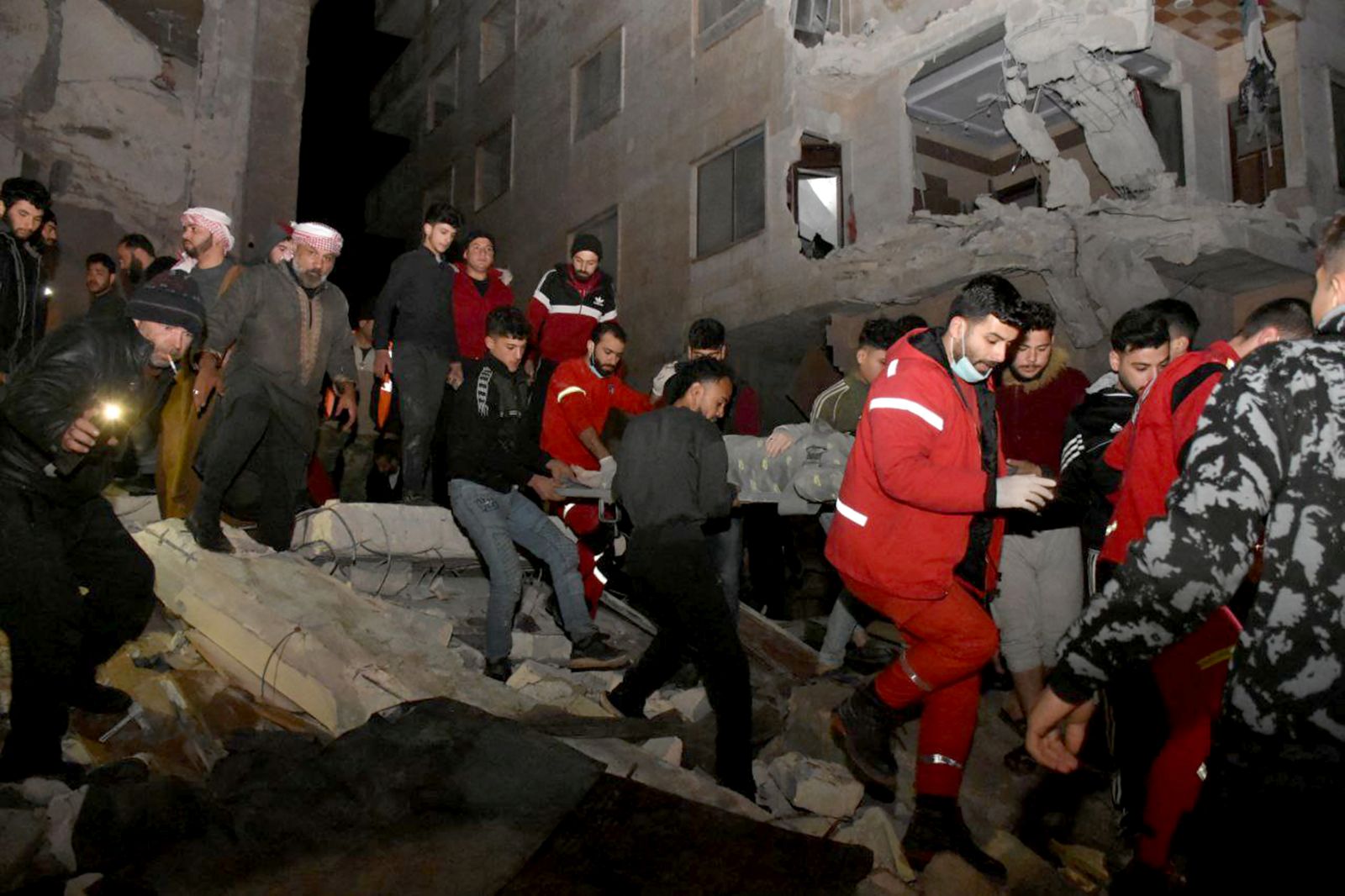 epa10450610 epa10450468 A handout photo made available by SANA shows rescue operations following the earthquake that affected Syria early morning, in the city of Hama, Syria 06 February 2023. According to the US Geological Service, an earthquake with a preliminary magnitude of 7.8 struck southern Turkey close to the Syrian border, causing buildings to collapse and sending shockwaves over northwest Syria, Cyprus, and Lebanon.  EPA/SANA  HANDOUT EDITORIAL USE ONLY/NO SALES