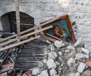 epa10462921 An icon in the rubble of the collapsed Virgin Mary Greek Orthodox Church after an earthquake in Altinozu, district of Hatay, Turkey, 12 February 2023. More than 27,000 people have died and thousands more were injured after two major earthquakes struck southern Turkey and northern Syria on 06 February. Authorities fear the death toll will keep climbing as rescuers look for survivors across the regions.  EPA/ERDEM SAHIN  ATTENTION: This Image is part of a PHOTO SET