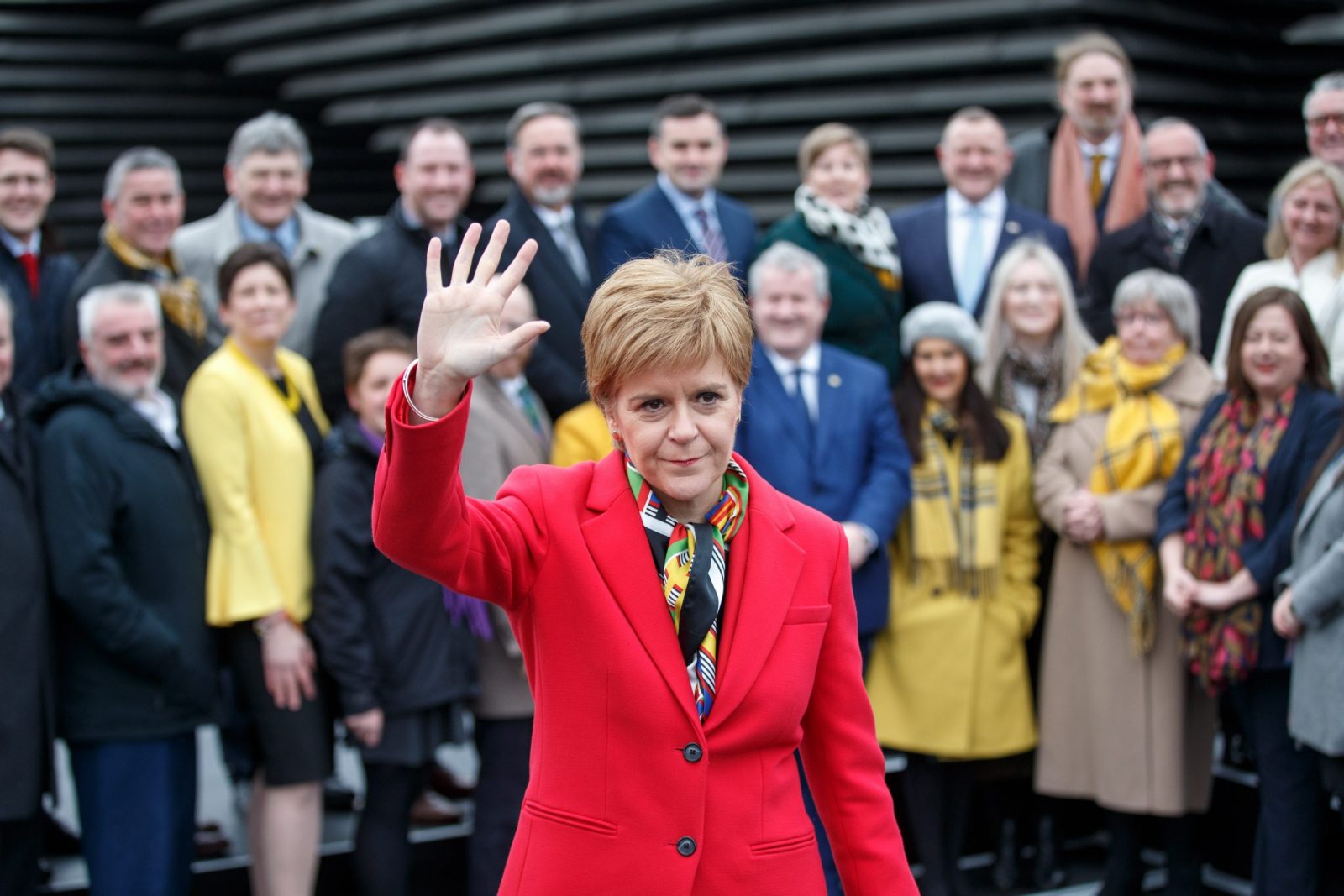 epa10467852 (FILE) - SNP leader Nicola Sturgeon joins the Scottish National Party SNP's newly elected MPs for a group photo outside the V&A Museum in Dundee, Scotland, Britain, 14 December 2019 (reissued 15 February 2023). Scotland's first minister Sturgeon on 15 February 2023 in a news conference announced she is resigning as First Minister.  EPA/ROBERT PERRY *** Local Caption *** 55708608