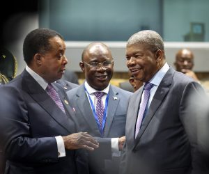 epa10473165 Angola's President Joao Lourenco (R) speaks with the Republic of the Congo President Denis Sassou Nguesso (L) at the start of the African Union Summit in Addis Ababa, Ethiopia, 17 February 2023. The African Union Summit runs until 19 February.  EPA/JOSE SENA GOULAO