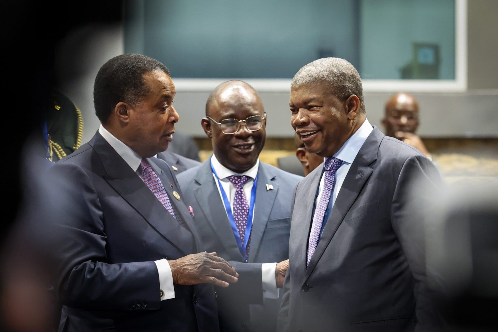 epa10473165 Angola's President Joao Lourenco (R) speaks with the Republic of the Congo President Denis Sassou Nguesso (L) at the start of the African Union Summit in Addis Ababa, Ethiopia, 17 February 2023. The African Union Summit runs until 19 February.  EPA/JOSE SENA GOULAO