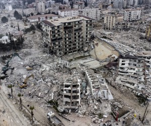 epa10481770 An aerial view taken with a drone shows, a view of collapsed buildings after a powerful earthquake in Hatay, Turkey, 21 February 2023. More than 46,000 people have died and thousands more are injured after two major earthquakes struck southern Turkey and northern Syria on 06 February.  EPA/ERDEM SAHIN