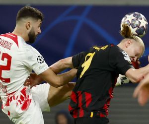 epa10484448 Josko Gvardiol
 (L) of Leipzig in action against Erling Haaland of Manchester City during the UEFA Champions League, Round of 16, 1st leg between RB Leipzig and Manchester City in Leipzig, Germany, 22 February 2023.  EPA/Hannibal Hanschke