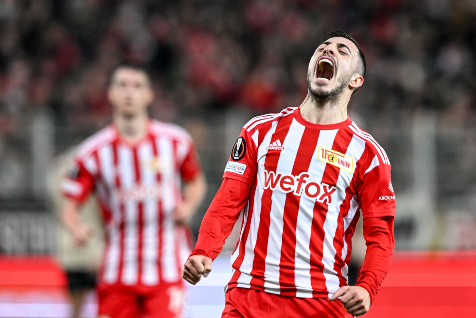 epa10486627 Josip Juranovic of Union celebrates after scoring  during the UEFA Europa League play-off, 2nd leg match between Union Berlin and Ajax Amsterdam in Berlin, Germany, 23 February 2023.  EPA/Filip Singer