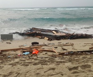 epa10491819 Debris washed ashore at a beach near Cutro, Crotone province, southern Italy, 26 February 2023. Italian authorities said on 26 February that at least 30 bodies were found on the beach and in the sea near Crotone, in the southern Italian region of Calabria, after a boat carrying migrants sank in rough seas near the coast. About forty people survived the accident, Italian firefighters added. Authorities fear the death toll will climb as rescuers look for survivors.  EPA/GIUSEPPE PIPITA