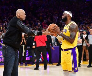 Feb 7, 2023; Los Angeles, California, USA; Former Los Angeles Lakers player Kareem Abdul-Jabbar hands the game ball to forward LeBron James (6) after James becomes the NBA all time scoring leader against the Oklahoma City Thunder during the second half at Crypto.com Arena. Mandatory Credit: Gary A. Vasquez-USA TODAY Sports Photo: Gary A. Vasquez/REUTERS