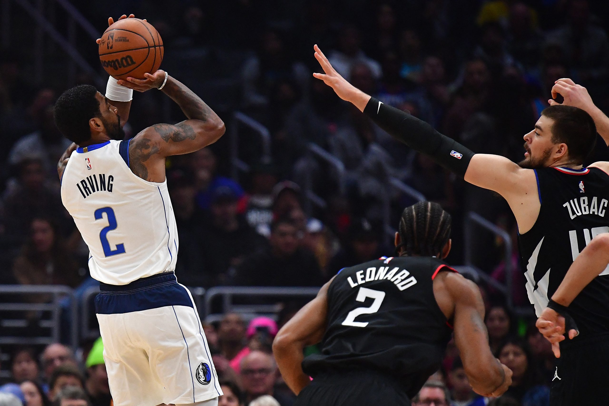 Feb 8, 2023; Los Angeles, California, USA; Dallas Mavericks guard Kyrie Irving (2) shoots against Los Angeles Clippers center Ivica Zubac (40) during the first half at Crypto.com Arena. Mandatory Credit: Gary A. Vasquez-USA TODAY Sports Photo: Gary A. Vasquez/REUTERS