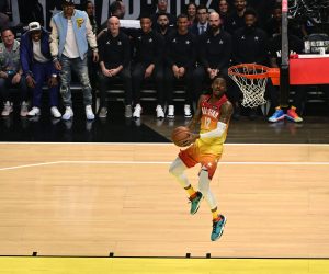 Feb 19, 2023; Salt Lake City, UT, USA; Team Giannis guard Ja Morant (12) dunks the ball during the first half in the 2023 NBA All-Star Game against Team LeBron at Vivint Arena. Mandatory Credit: Christopher Creveling-USA TODAY Sports Photo: Christopher Creveling/REUTERS