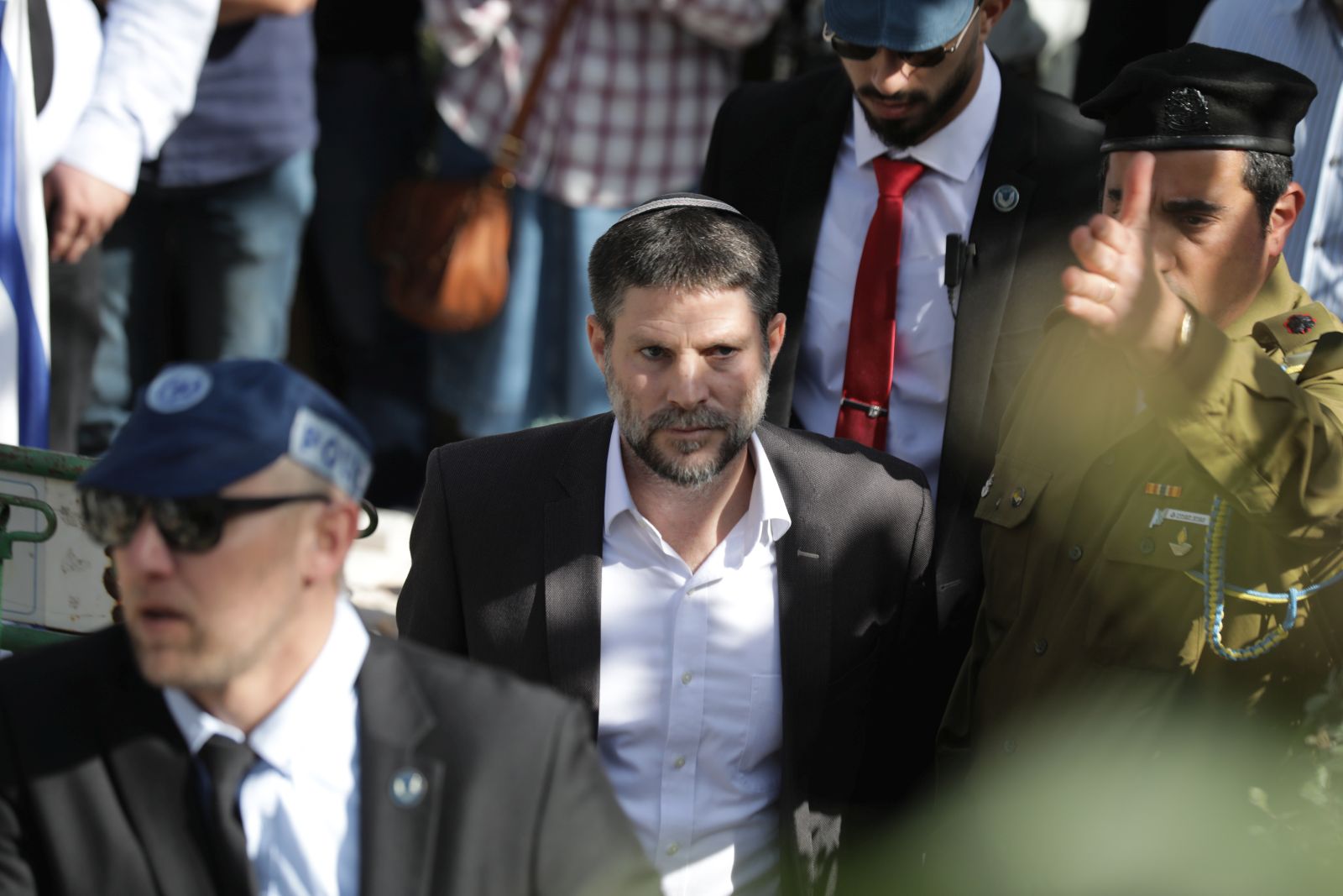 epa10493694 Israeli Finance Minister Bezalel Smotrich attends the funeral of two Israeli brothers Hillel and Yagel Yaniv at the Mount Herzl military cemetery in Jerusalem, 27 February 2023. Hillel and Yagel Yaniv were shot dead by a Palestinian driver on 26 February, as Israeli authorities said, near the Palestinian village of Hawara close to the city of Nablus in the West Bank.  EPA/ABIR SULTAN