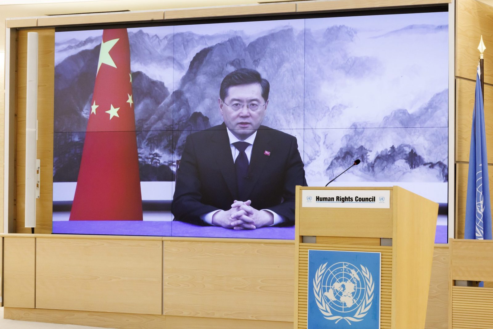 epa10493938 China's Minister for Foreign Affairs Qin Gang appears on a screen as he delivers a remote statement, during the High-Level Segment of the 52nd session of the Human Rights Council, at the European headquarters of the United Nations in Geneva, Switzerland, 27 February 2023.  EPA/SALVATORE DI NOLFI