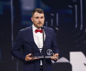 epa10494369 Polish soccer player Marcin Oleksy of Warta Pozna with his FIFA Puskas Award on stage during the The Best FIFA Football Awards 2022 ceremony in Paris, France, 27 February 2023.  EPA/YOAN VALAT