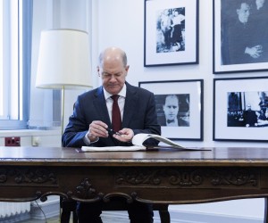 epa10494938 German Chancellor Olaf Scholz after signing the guest book during a visit at the territorial defence command of the Bundeswehr, Germany's armed forces, in Berlin, Germany, 28 February 2023. The command was reformed last year to introduce a more centralized command structure for the Bundeswehr's domestic roles, including a better preparedness for hybrid destabilization attempts. The creation of the new command was in part a reaction to Russia's ongoing war in Ukraine.  EPA/Carsten Koall / POOL