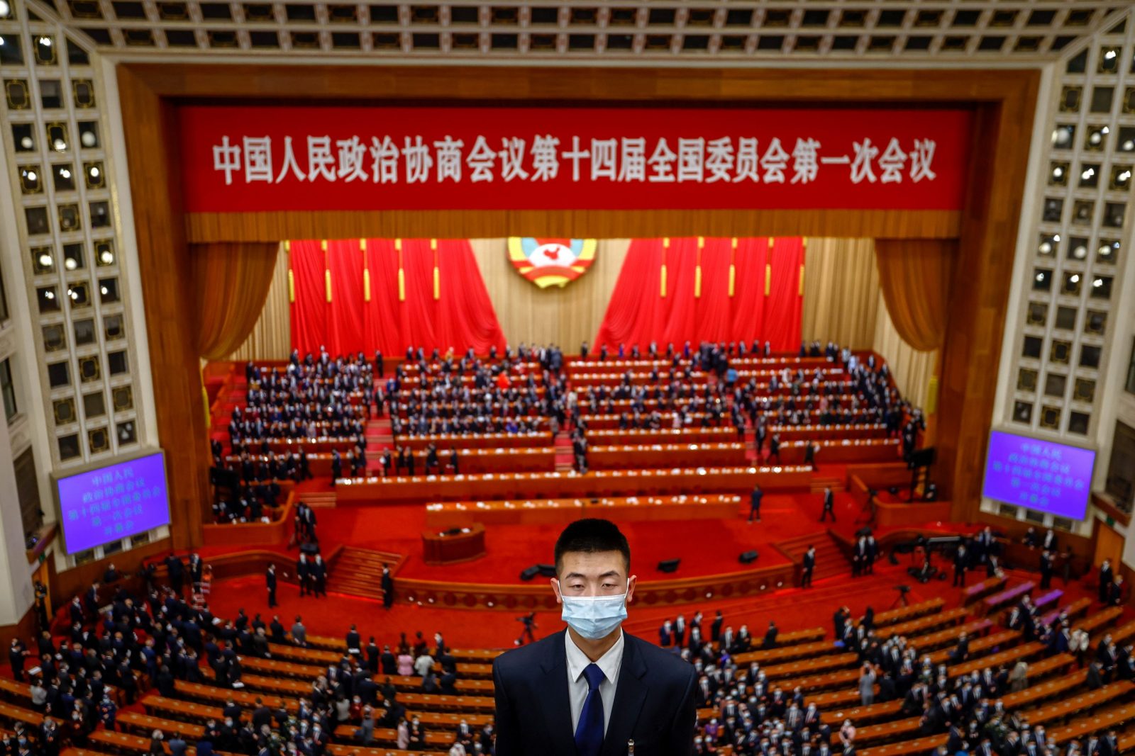 epa10502066 A security member stands guard after the opening session of the Chinese People's Political Consultative Conference (CPPCC) at the Great Hall of the People, in Beijing, China, 04 March 2023. China holds two major annual political meetings, the National People's Congress (NPC) and the Chinese People's Political Consultative Conference (CPPCC) which run alongside and together are known as 'Lianghui' or 'Two Sessions'.  EPA/MARK R. CRISTINO