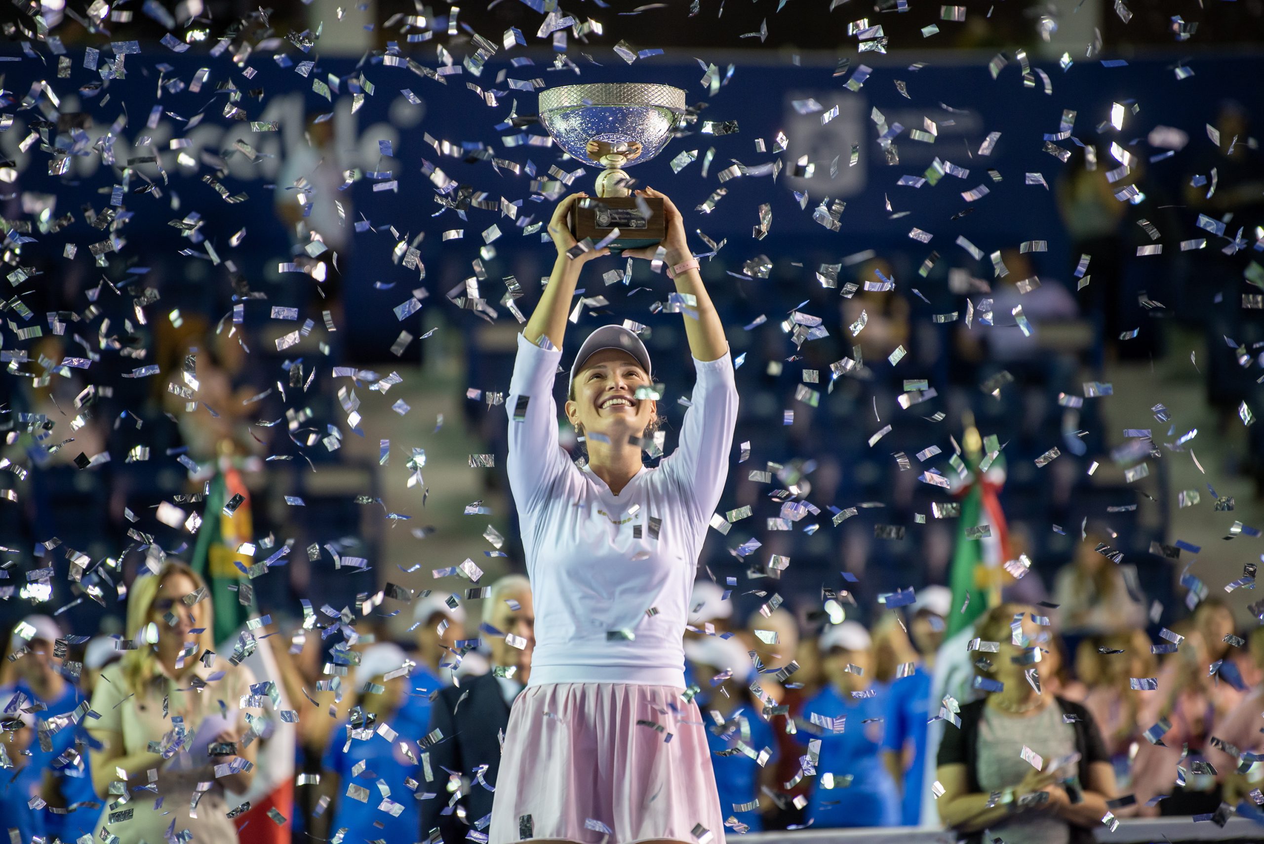 epa10505725 Donna Vekic of Croatia celebrates with the trophy after defeating Caroline Garcia of France in the final of the Monterrey Open tennis tournament, in Monterrey, Mexico, 05 March 2023.  EPA/MIGUEL SIERRA