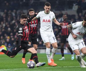 epa10510371 AC Milan's Brahim Diaz (L) takes a shot on goal as Tottenham's Ivan Perisic (C) and Rafael Leao (R) look on during the UEFA Champions League, Round of 16, 2nd leg match between Tottenham Hotspur and AC Milan in London, Britain, 08 March 2023.  EPA/Andy Rain