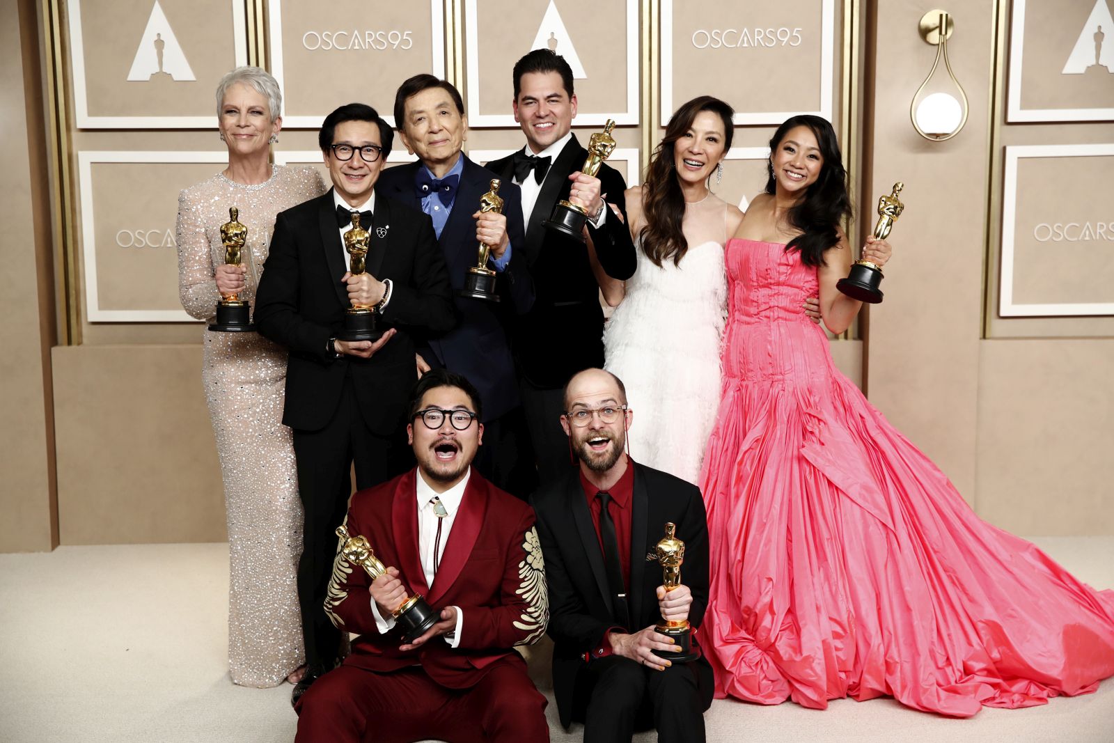 epa10519409 (L-R top row) Jamie Lee Curtis, winner of the Best Supporting Actress award, Ke Huy Quan, winner of the Best Actor In A Supporting Role award, James Hong, Jonathan Wang, winner of the Best Picture award, Michelle Yeoh, winner of the Best Actress in a Leading Role award, Stephanie Hsu and (L-R bottom row) Dan Kwan and Daniel Scheinert, winners of the Best Director and Best Picture award for 'Everything Everywhere All at Once,' pose in the press room during the 95th annual Academy Awards ceremony at the Dolby Theatre in Hollywood, Los Angeles, California, USA, 12 March 2023. The Oscars are presented for outstanding individual or collective efforts in filmmaking in 24 categories.  EPA/CAROLINE BREHMAN