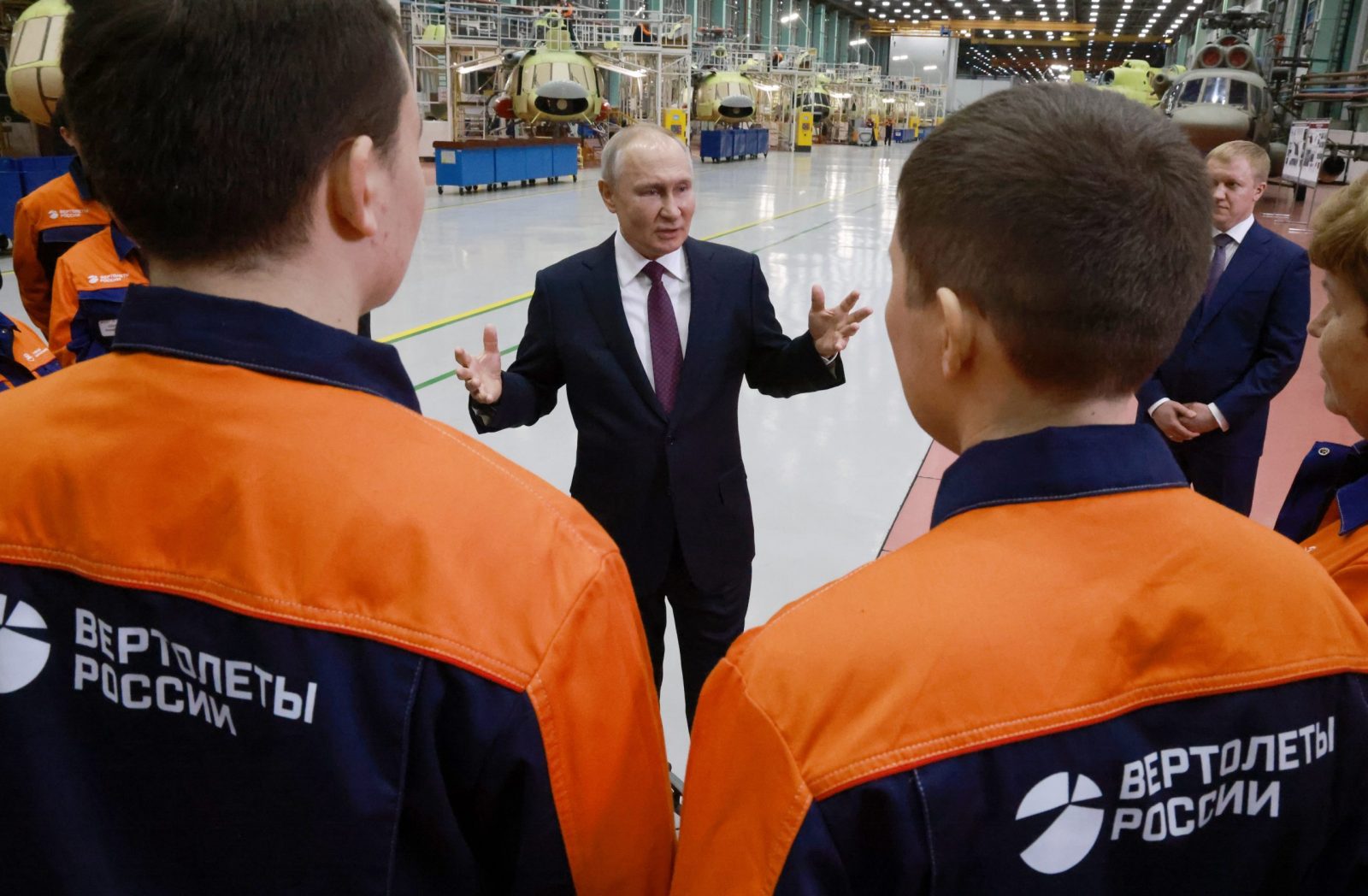epa10522551 Russian President Vladimir Putin meets with staff members during his visit to the Ulan-Ude Aviation Plant, part of the Rostec's Russian Helicopters manufacturing company, in Ulan-Ude, the Republic of Buryatia, Russia, 14 March 2023. Putin is on a working trip to Buryatia, where he visited the Ulan-Ude Aviation Plant, one of Russia's leading helicopter manufacturers.  EPA/VLADIMIR GERDO /SPUTNIK/KREMLIN / POOL MANDATORY CREDIT