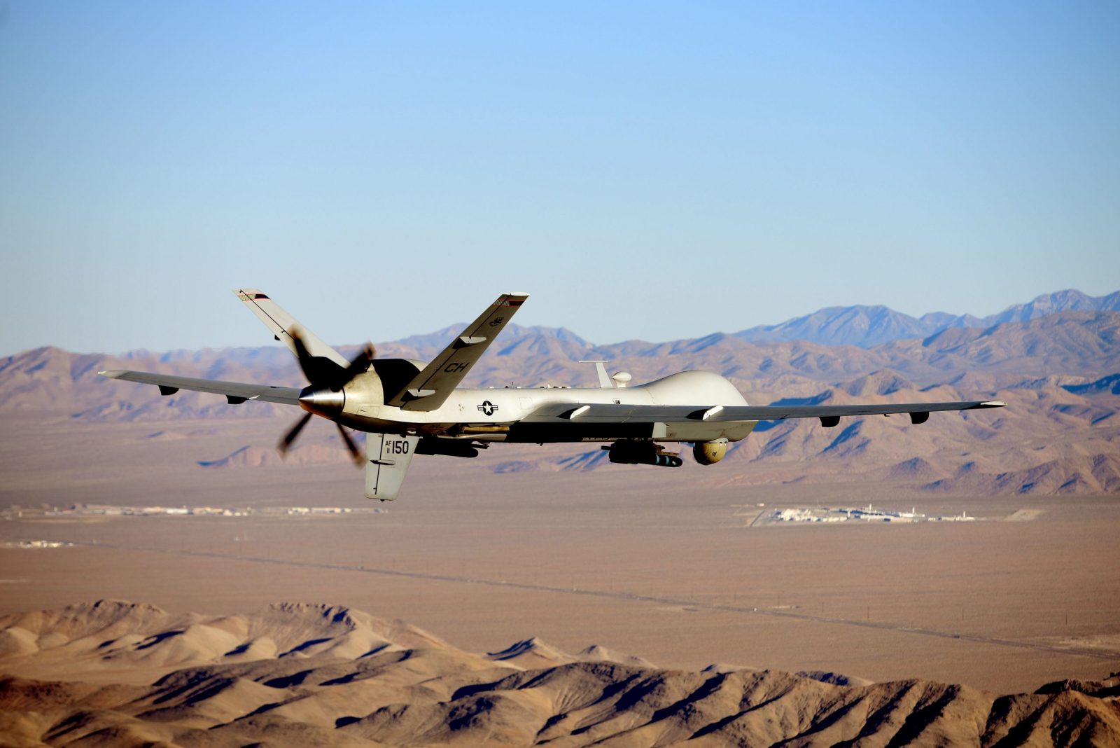 epa10522758 A handout photo made available by the U.S. Air Force of an MQ-9 Reaper flying a training mission over the Nevada Test and Training Range, USA 15 July 2019 (issued 14 March 2023). The United States European Command (EUCOM) said in a statement that two Russian Su-27 aircraft 'conducted an unsafe and unprofessional intercept' with a US unmanned MQ-9 aircraft that was operating within international airspace over the Black Sea on 14 March 2023. The incident occurred at about 7:03 AM (CET) when one of the Russian aircraft struck the propeller of the MQ-9 causing US forces to bring the unmanned aircraft down in international waters, the statement added.  EPA/Airman 1st Class William Rio Rosado HANDOUT  HANDOUT EDITORIAL USE ONLY/NO SALES