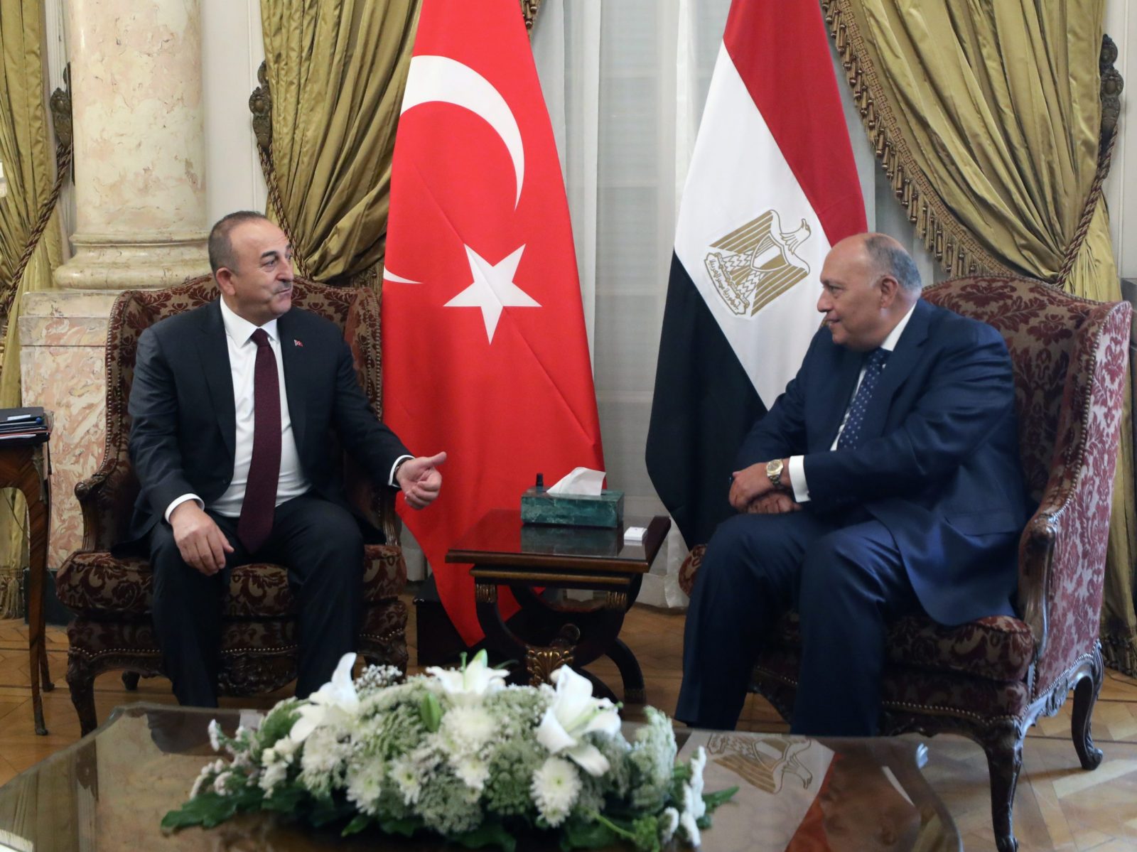 epa10529543 Egyptian Foreign Minister Sameh Shoukry (R) meets with Turkish Foreign Minister Mevlut Cavusoglu (L) at the Ministry of Foreign Affairs in Cairo, Egypt, 18 March 2023.  EPA/KHALED ELFIQI