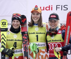 epa10530175 (L-R) Second placed Leona Popovic of Croatia, winner Petra Vlhova of Slovakia and third placed Mikaela Shiffrin of the USA celebrate on the podium after the Women's Slalom race at the FIS Alpine Skiing World Cup finals in the skiing resort of El Tarter, Andorra, 18 March 2023.  EPA/Guillaume Horcajuelo