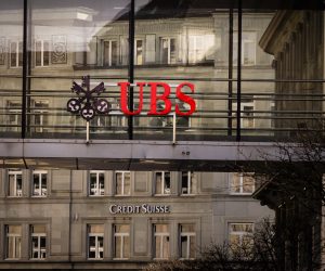epa10530045 Logos of the Swiss banks 'Credit Suisse' and 'UBS' are seen on different buildings in Zurich, Switzerland, 18 March 2023.  EPA/MICHAEL BUHOLZER