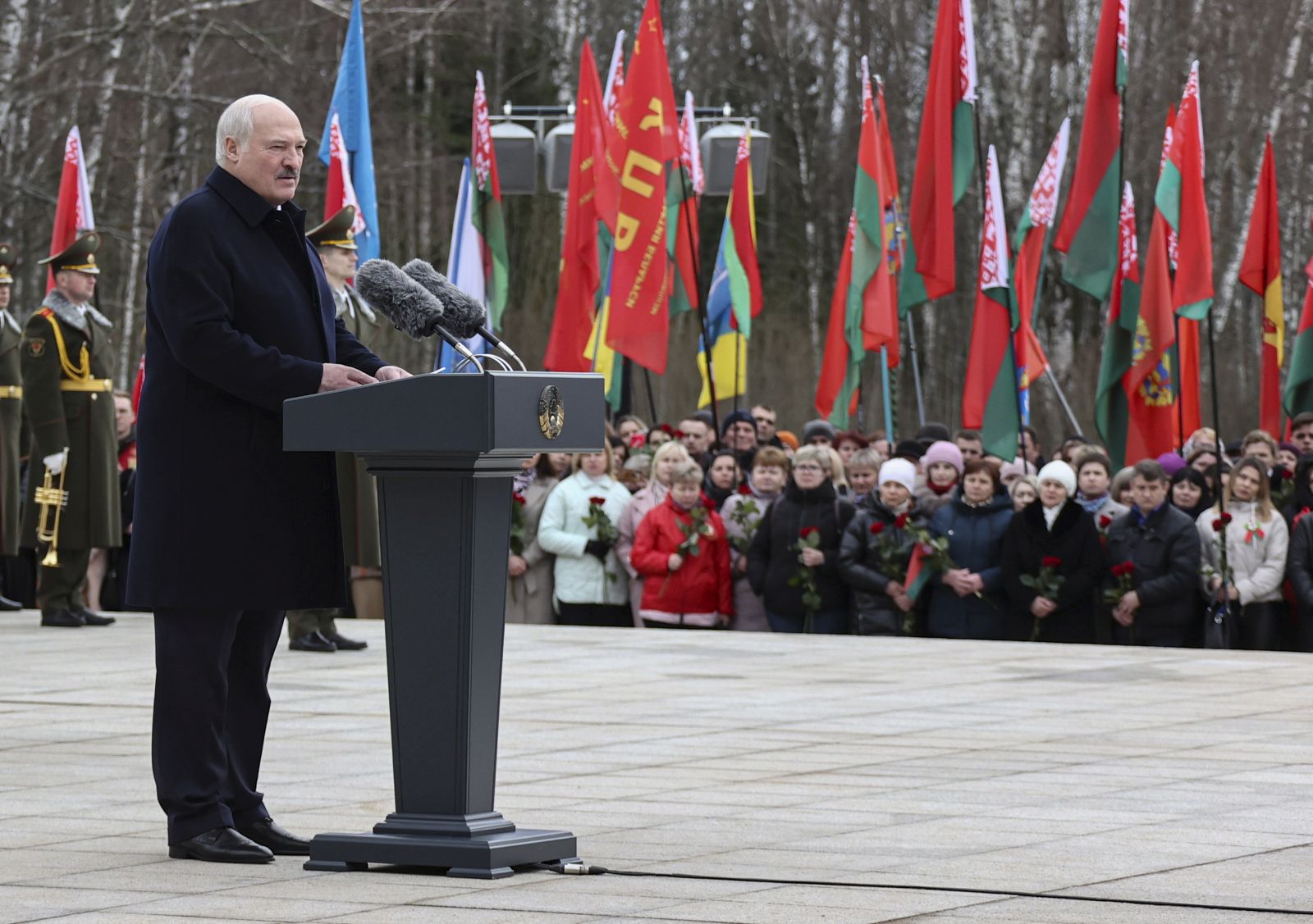 epa10536830 A handout photo made available by the Belarus Presidential Press Service shows Belarusian President Alexander Lukashenko delivering a speech during a ceremony to mark the 80th anniversary of the Khatyn Massacre, at the Eternal Flame at the Khatyn Memorial Complex in Khatyn, Belarus, 22 March 2023. On 22 March 1943, in retaliation for an attack by Soviet partisans, Nazi Germany’s troops gathered 149 Khatyn residents, including 75 children, into a barn and set it on fire before proceeding to destroy the whole village and shooting those who managed to escape the fire.  EPA/BELARUS PRESIDENT PRESS SERVICE /HANDOUT  HANDOUT EDITORIAL USE ONLY/NO SALES