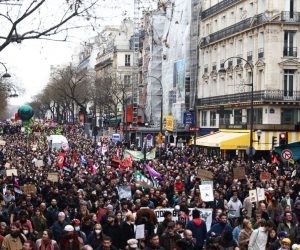 epa10538976 Thousands of people participate in a protest against the government's reform of the pension system in Paris, France, 23 March 2023. Protests continued in France after the French prime minister announced on 16 March 2023 the use of Article 49 paragraph 3 (49.3) of the French Constitution to have the text on the controversial pension reform law be definitively adopted without a vote in the National Assembly (lower house of parliament). The bill would raise the retirement age in France from 62 to 64 by 2030.  EPA/MOHAMMED BADRA