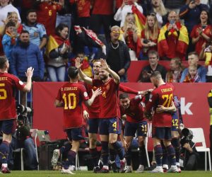 epa10543483 Spain's players celebrate after scoring during the Euro 2024 Qualifier soccer match between Spain and Norway, in Malaga, southern Spain, 25 March 2023.  EPA/Jorge Zapata