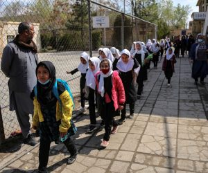 epa10543347 Schoolgirls attending up to primary grade classes leave school at the start of the new academic year in Kabul, Afghanistan, 25 March 2023. As schools reopen for a new academic year across the country, hundreds of thousands of teenage girls will not be able to go to classes after Taliban authorities banned female students from secondary education. UNICEF urged authorities to lift the ban on girls' and women's further education in a statement on 21 March 2023.  EPA/SAMIULLAH POPAL