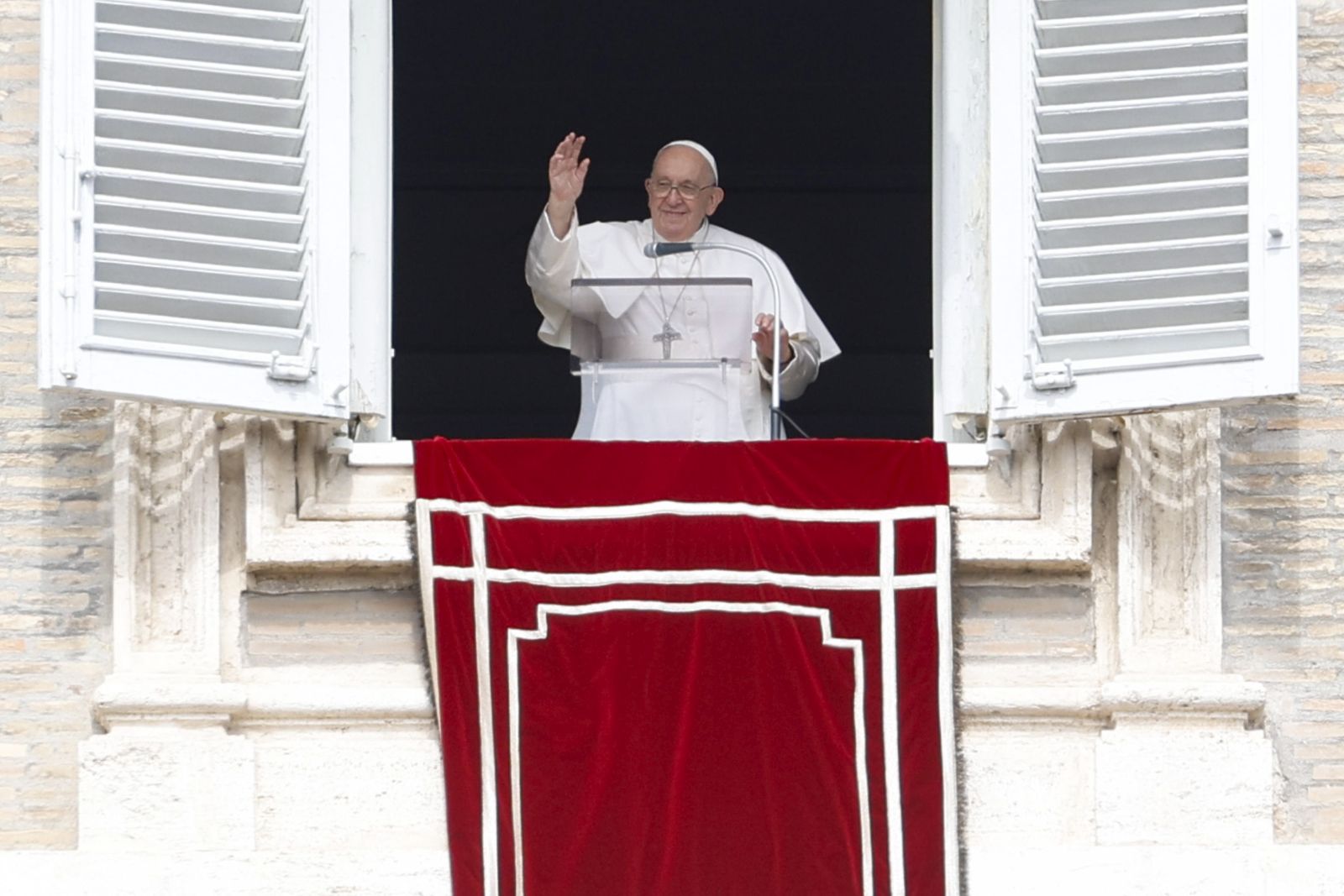 epa10543850 Pope Francis blesses the faithfuls from the window of his office overlooking St. Peter's Square during the Angelus Prayer in Vatican City, 26 March 2023.  EPA/FABIO FRUSTACI