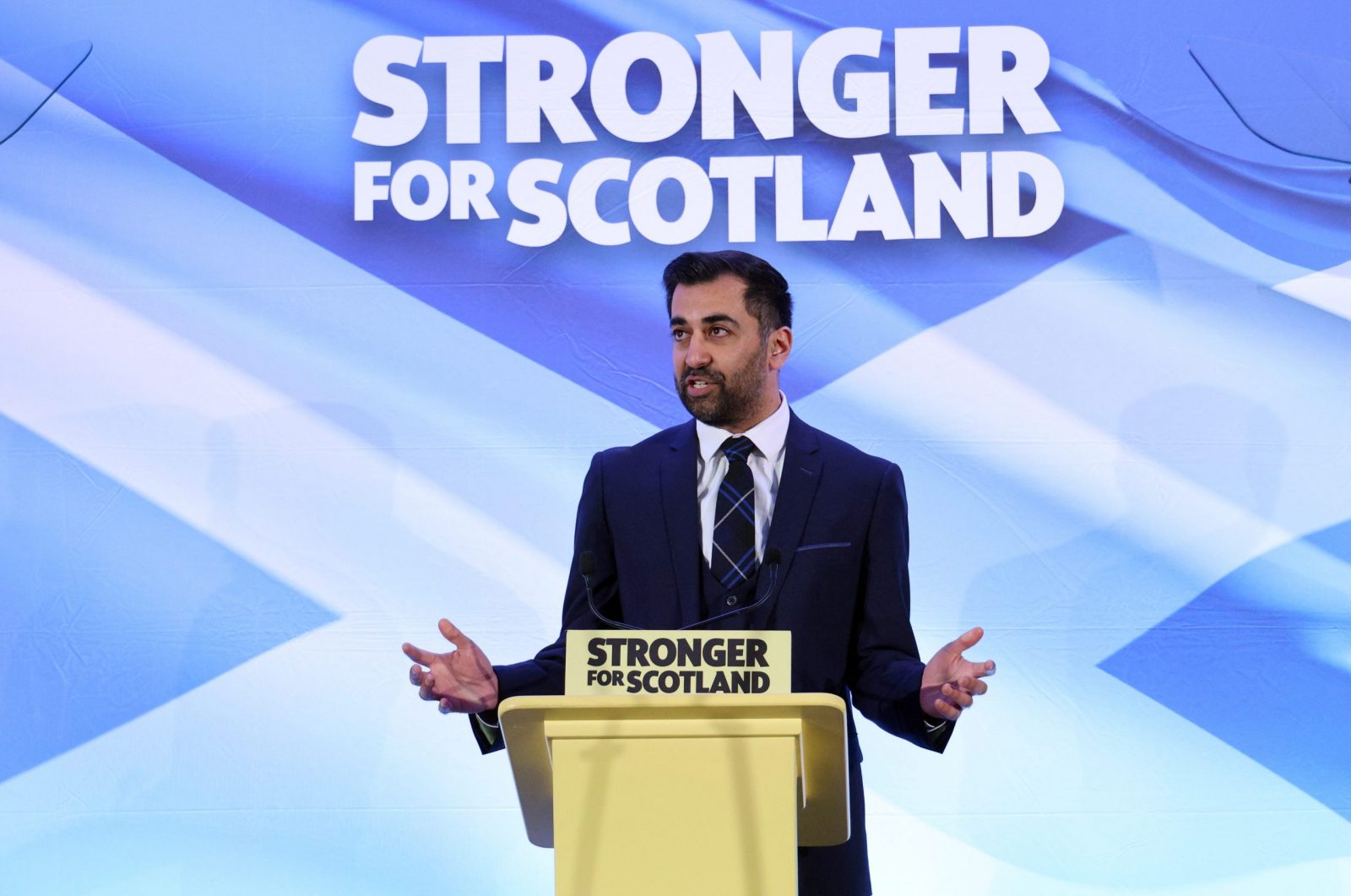 epa10545509 The new leader of the Scottish National Party and former Health Secretary Humza Yousaf speaks after he is announced at Murrayfield Stadium in Edinburgh, Scotland, Britain 27 March 2023. The result follows a five-week contest after the former leader and First Minister Nicola Sturgeon stood down. There will be a vote in Holyrood parliament on 28 March to select the next first minister.  EPA/ROBERT PERRY